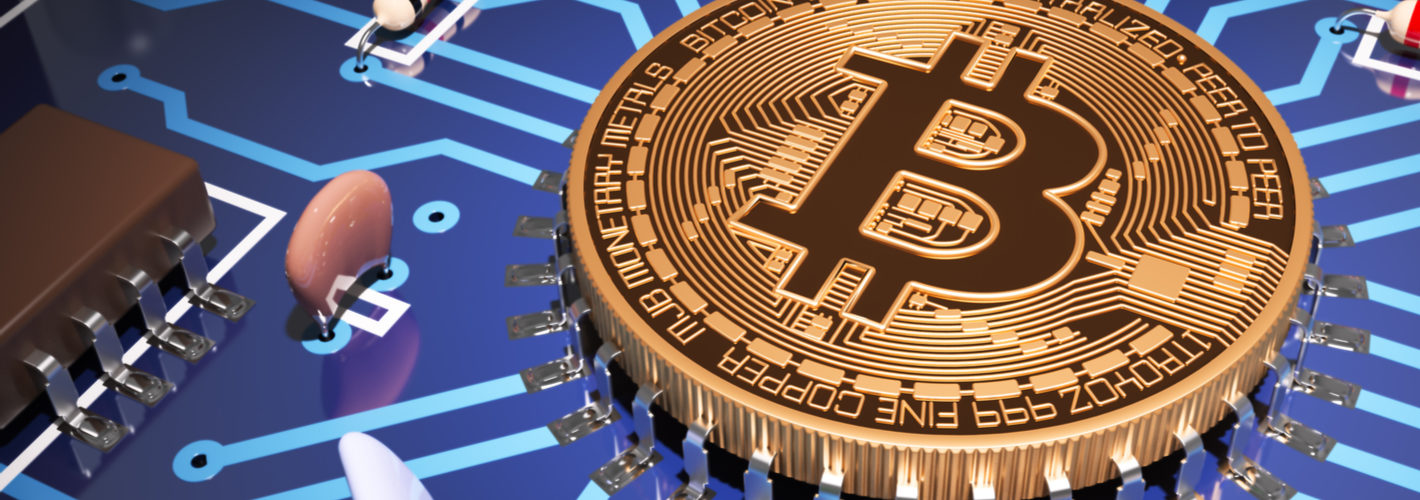 Concept Of Bitcoin Like A Computer Processor On Motherboard. via Shutterstock